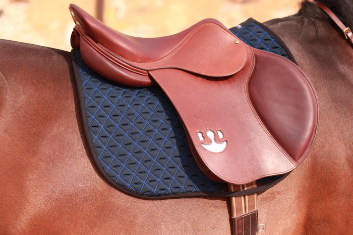 clean blue INFI-KNIT saddle pad