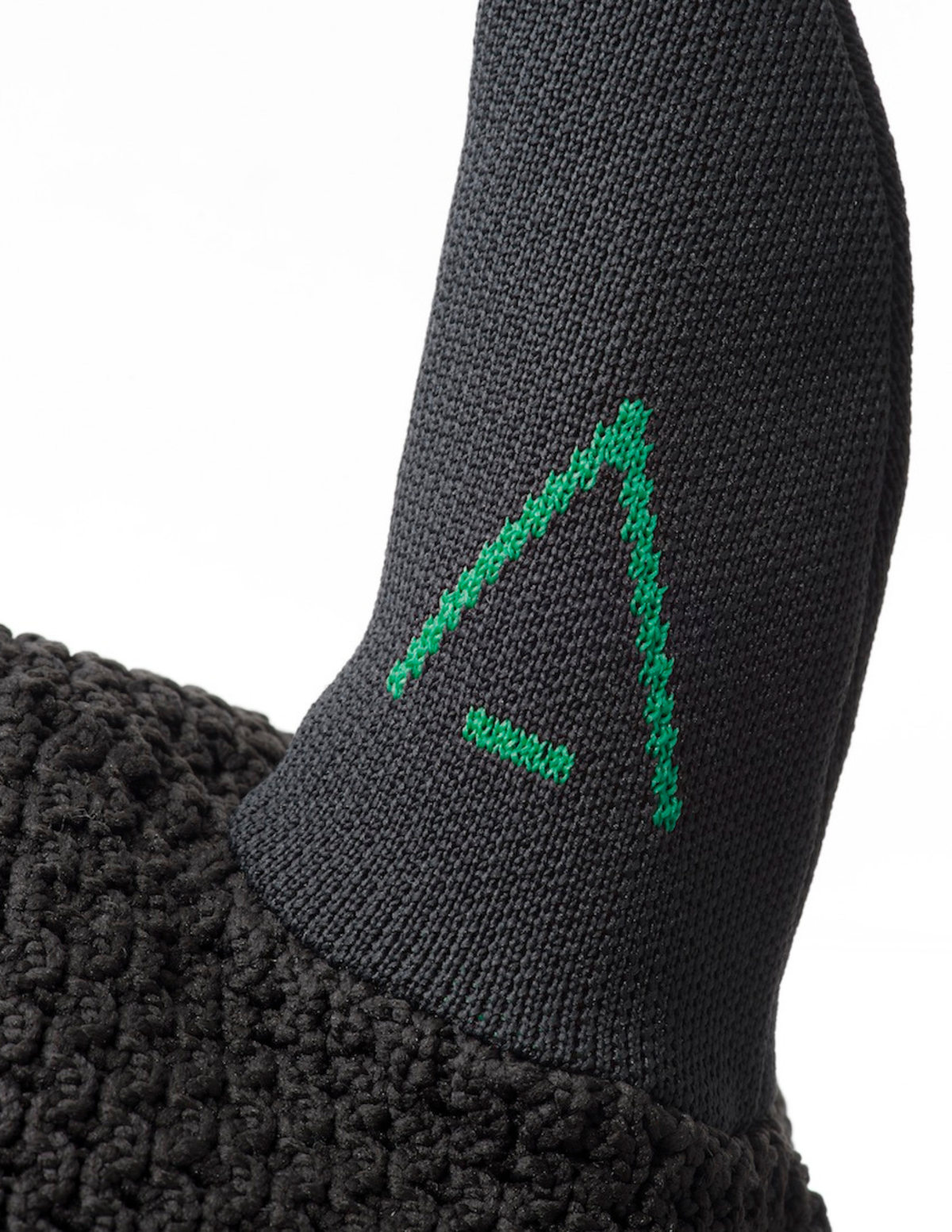 Bonnet INFI-KNIT noir A vert émeraude