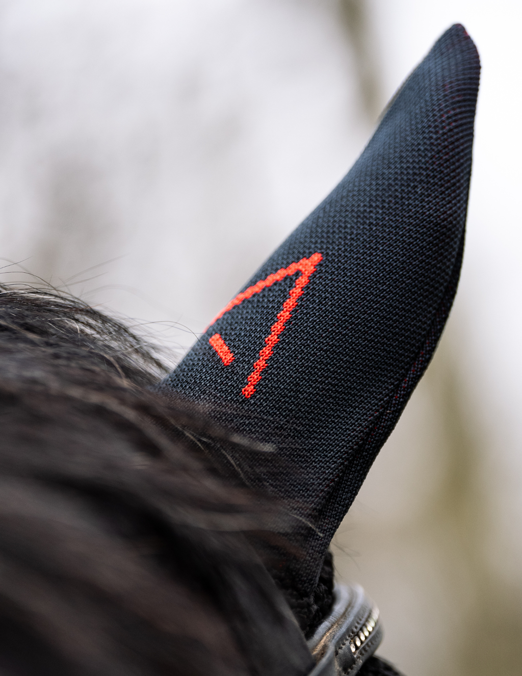 Black INFI-KNIT ear-net A red